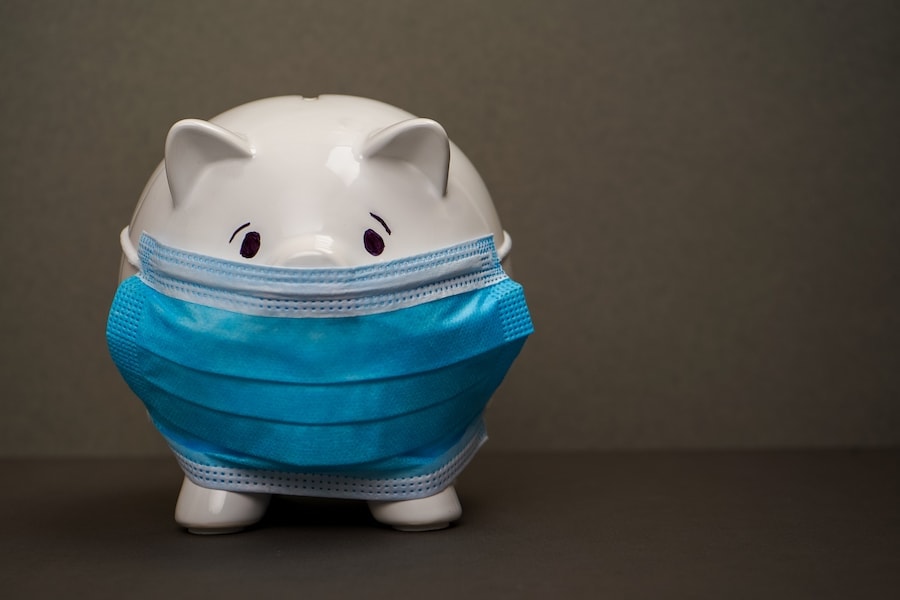 Piggy Bank Wearing A Blue Surgical Mask.